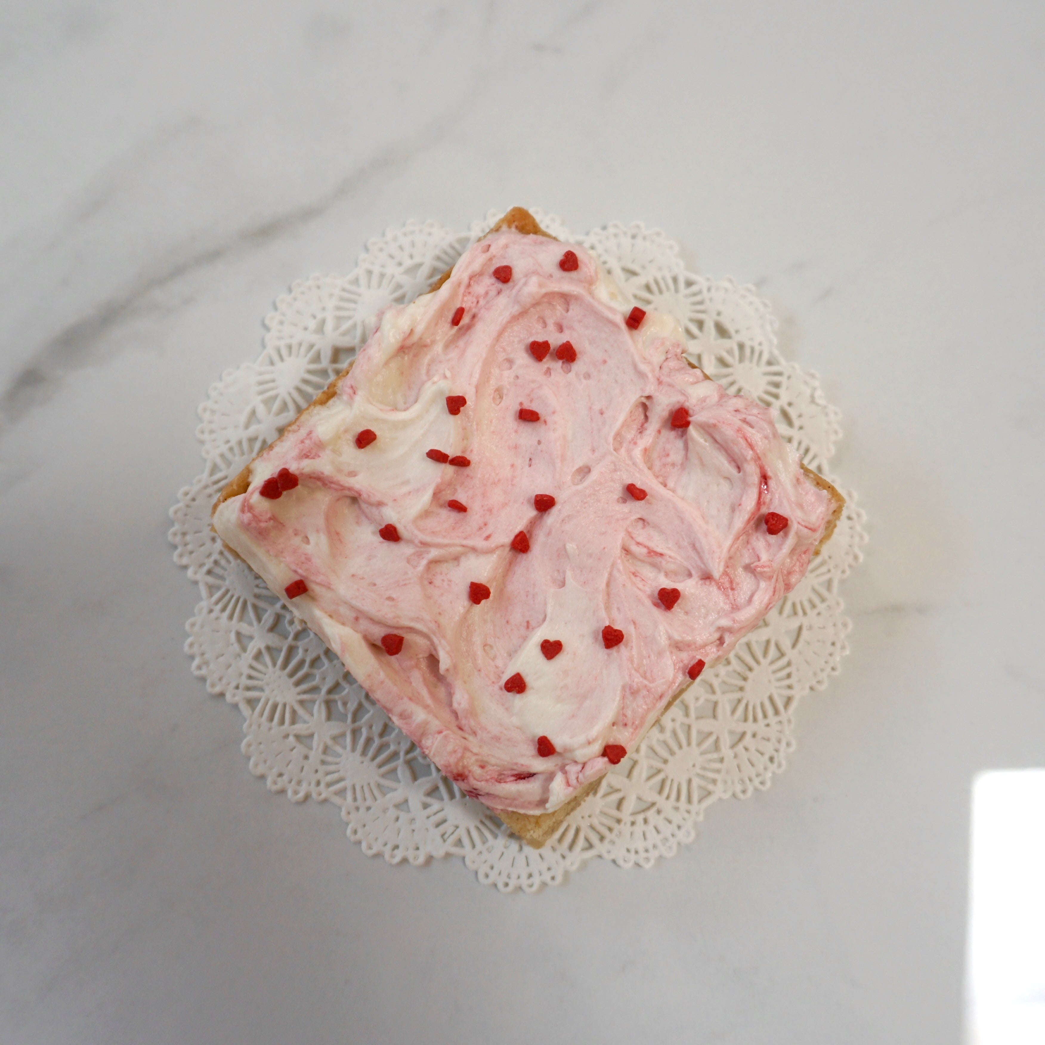 Raspberry Swirl Frosted Sugar Cookie Bar